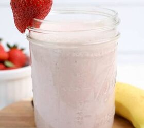 classic chinese scallion chicken recipe in 30 minutes, A colorful strawberry banana smoothie in a clear glass showcasing a blend of strawberries and bananas on a cutting board