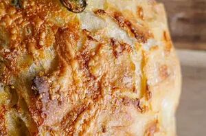 A homemade jalapeño bread that's no-knead & packed with warm, gooey cheese