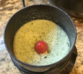 easy diy garlic scape salt recipe, dried garlic scape salt after being pulsed in a coffee grinder