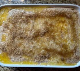 sourdough apple pie cobbler with fresh milled flour, top view of dessert topped with melted butter and brown sugar