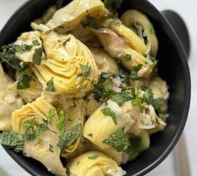 shrimp scampi without wine, A bowl of marinated artichokes with chopped mint on top and a spoon