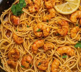 oven baked blackened salmon recipe, Cajun shrimp scampi made with spaghetti in a large skillet with lemon wedges