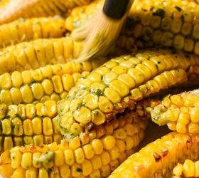 pesto butter corn ribs, Using a brush to spread the pesto butter onto the corn ribs