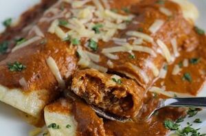 These chicken enchiladas stole her heart and they might steal yours too