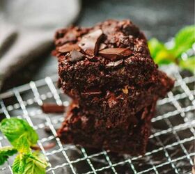 zucchini brownies recipe moist and fudgy brownies, A stack of zucchini brownies on a wire cooling rack