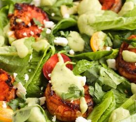 refreshing watermelon strawberry salad recipe, Blackened shrimp salad with avocado dressing cherry tomatoes feta cheese and romaine lettuce in a white bowl
