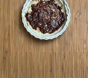 apple rose tart for two, Pastry dough in bottom of tart dish and mixture of apricot preserve and cinnamon spread on bottom