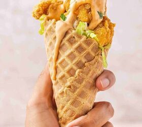 spicy chicken waffle cones with creamy sriracha sauce, Chicken waffle cone held in hand perfect for party food