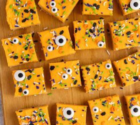 halloween sugar cookie bars, Halloween Sugar Cookie Bars with orange icing on a cutting board from above