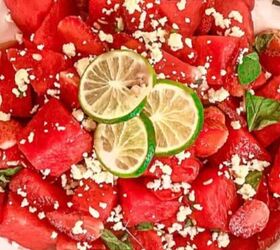 quick and easy teriyaki orange sauce recipe, Top down view of watermelon strawberry salad with feta cheese mint and lime in a white bowl beside lime slices
