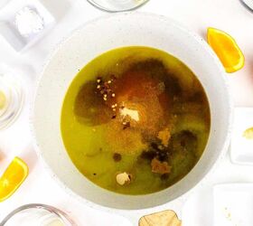 quick and easy teriyaki orange sauce recipe, aucepan with orange juice and seasonings including soy sauce garlic powder ginger and chili flakes for teriyaki orange sauce