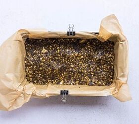 cinnamon rice cake protein bars with dates maple cream cheese frost, cinnamon rice cake protein bars base pressed into parchment lined loaf pan