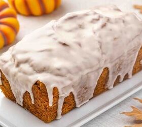 easy pumpkin bread with cake mix moist delicious, Whole moist pumpkin spice bread loaf generously drizzled with glaze on a rustic ceramic platter