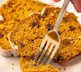 easy pumpkin bread with cake mix moist delicious, Close up of a fork cutting into a moist slice of pumpkin bread showing the soft crumb texture