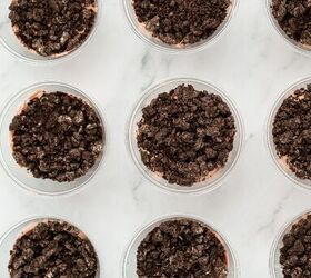 graveyard dirt cake cups easy no bake halloween, Halloween dirt pudding cups topped with crushed Oreo cookie crumbs for the final dessert layer