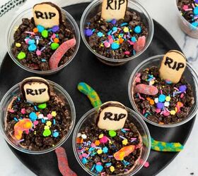 graveyard dirt cake cups easy no bake halloween, Close up of spooky Halloween dirt cake cups with RIP cookie gravestones gummy worms and festive sprinkles