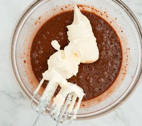 graveyard dirt cake cups easy no bake halloween, Mixing cream cheese into chocolate pudding mixture in a glass bowl with electric mixer beaters
