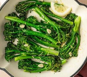 Saut ed broccoletti with garlic in a white cast iron skillet