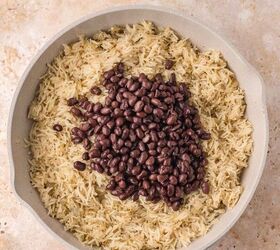 black beans and rice, Drained black beans sitting on top of the cooked rice just before being stirred together