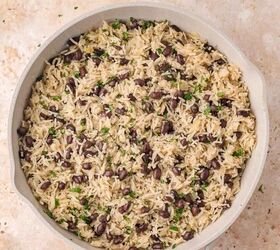 black beans and rice, Fully cooked black beans and rice in the skillet fluffed and garnished with chopped fresh cilantro