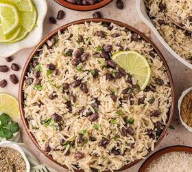 black beans and rice, Overhead shot of a serving bowl of black beans and rice with lime slices surrounded by small bowls of ingredients