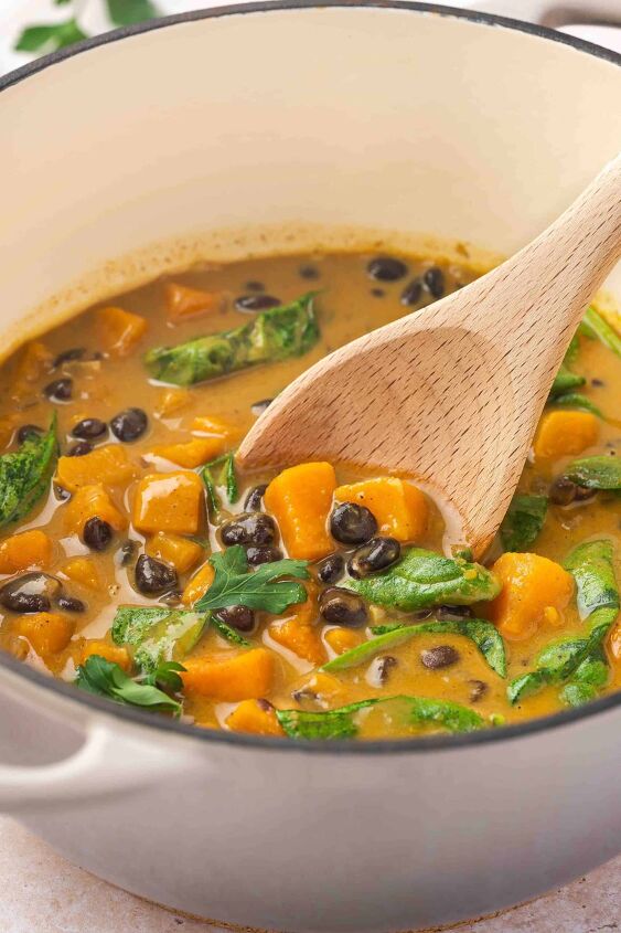 sweet potato black bean coconut curry easy one pot recipe, Close up of creamy curry in a pot with tender sweet potatoes and black beans