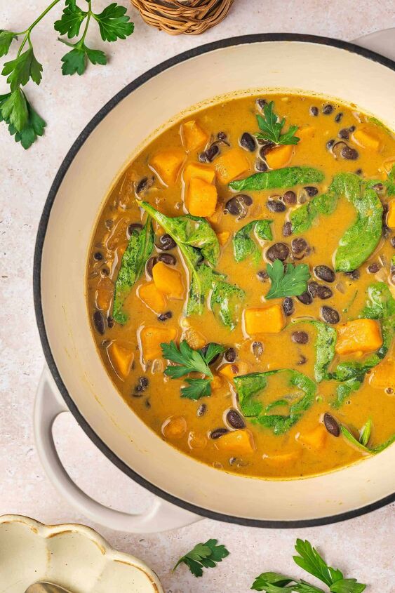 sweet potato black bean coconut curry easy one pot recipe, Creamy sweet potato black bean coconut curry simmering in a large pot