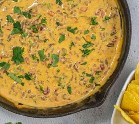easy beef queso dip with rotel, Ground beef queso dip with Rotel and Velveeta cheese in a large skillet