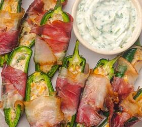 easy beef queso dip with rotel, Air fryer bacon wrapped jalapeno poppers on a plate with ranch dip