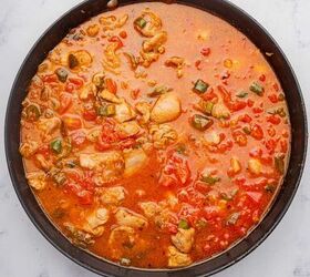 one pot cheesy mexican chicken and rice, Rotel tomatoes and chicken broth added to the chicken and rice