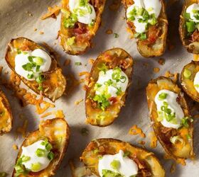 loaded potato skins everyone s favorite appetizer, Overhead image of Loaded Potato Skins on parchment paper