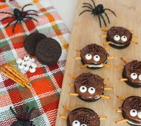 oreo spider cookies recipe for halloween parties, Cute Halloween spider cookies made with Oreos chocolate sprinkles candy eyes and pretzel legs on a board