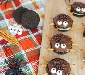 oreo spider cookies recipe for halloween parties, Close view of Oreo spider cookies topped with chocolate sprinkles and candy eyes on fall themed cloth