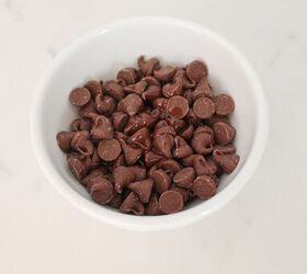 oreo spider cookies recipe for halloween parties, Bowl of milk chocolate chips ready for melting for Oreo spider cookies