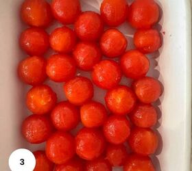cherry tomato confit with basil and thyme mediterranean style, A white rectangular dish filled with neatly arranged peeled cherry tomatoes in rows evokes a Mediterranean vibe There is a white circle with the number 3 in the bottom left corner of the image