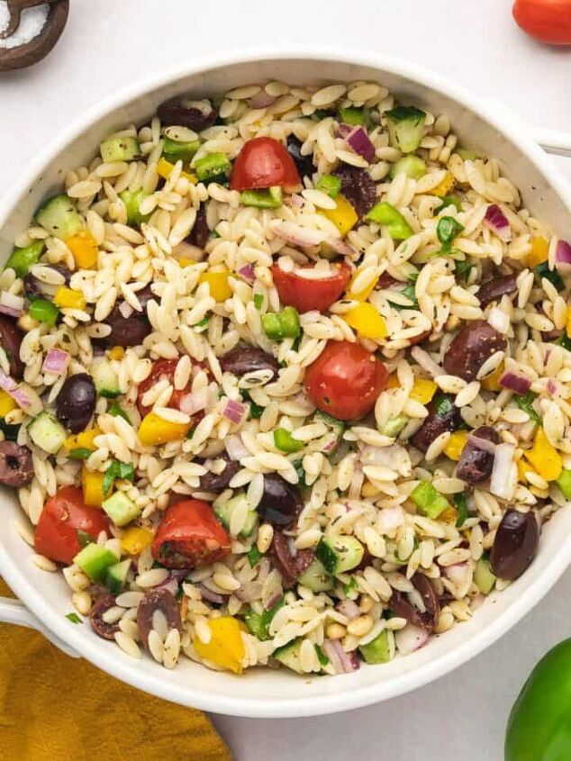 easy 3 ingredient pumpkin muffins with spice cake mix, Close up of Mediterranean orzo pasta salad with cucumbers cherry tomatoes and olives