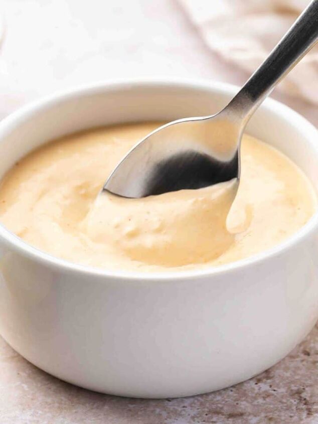 easy 3 ingredient pumpkin muffins with spice cake mix, Spicy garlic aioli in a small dish with a spoon perfect for dipping shrimp