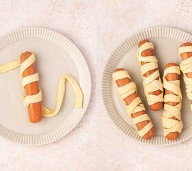 spooky cute air fryer mummy hot dogs kids will love, Hot dog wrapped in crescent roll strips with gaps for mummy look and eyes