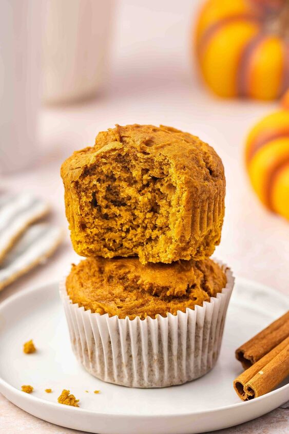 easy 3 ingredient pumpkin muffins with spice cake mix, Inside view of a pumpkin muffin with moist and fluffy crumb