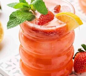 easy raspberry moscow mule party ready mint cocktail, Strawberry lemonade mocktail with mint and lemon garnish on marble surface