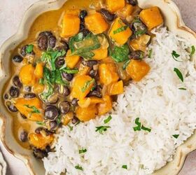 easy raspberry moscow mule party ready mint cocktail, Sweet potato black bean coconut curry served with fluffy white rice in a bowl
