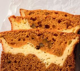 perfectly moist cream cheese pumpkin bread recipe, Close up of sliced cream cheese pumpkin bread highlighting the rich pumpkin color chopped walnuts and creamy filling