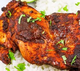 perfectly moist cream cheese pumpkin bread recipe, Close up view of spiced tandoori masala chicken thigh on white rice with cilantro leaves