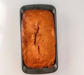 perfectly moist cream cheese pumpkin bread recipe, Freshly baked cream cheese pumpkin bread cooling in the loaf pan with a golden brown top