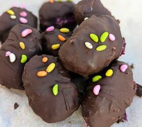 chocolate bounty blueberry bites, A close up of Chocolate Bounty Blueberry Bites topped with sugar coated fennel seeds