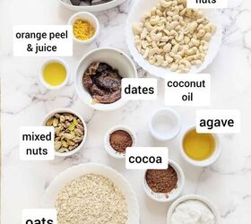 no bake chocolate orange mousse cake with crunchy oats, A flat lay of labeled ingredients for a chocolate orange mousse cake including cashew nuts oats dates chocolate cocoa coconut cream and orange peel with juice The ingredients are arranged on a marble surface ready for preparation