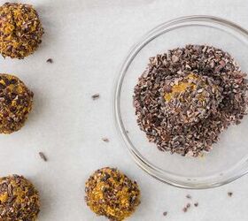 pumpkin spice protein energy balls, pumpkin spice energy balls being rolled in cacao nibs coating