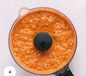 muhammara recipe roasted red pepper dip gf, A food processor filled with a creamy orange red muhammara recipe sauce viewed from above The sauce has a slightly chunky texture The black blade is visible in the center A white circle with the number 4 is in the bottom left corner