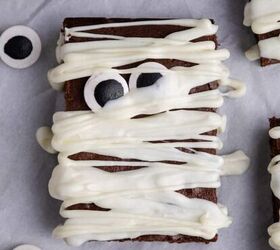 cranberry sauce bread, Mummy Brownie with googly eyeballs on parchment paper