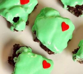 homemade shrimp and vegetable stir fry in 30 minutes, Small square chocolate brownies topped with bright green frosting and decorated with little red candy hearts arranged on a white plate for a festive Grinch inspired treat